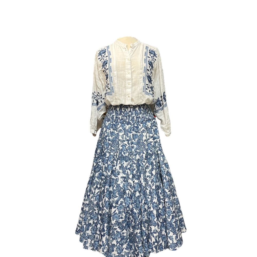 Outfit that  has hobo shirt and a maxi skirt , long length and flowy